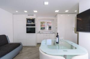 Kuchyň nebo kuchyňský kout v ubytování Apartment Bellovar