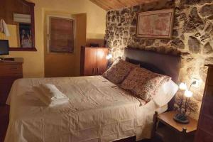 Postel nebo postele na pokoji v ubytování Casa Cabaleira + 27 fotografií