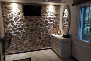 Телевизор и/или развлекательный центр в Klovino beach house