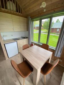 Kuchyň nebo kuchyňský kout v ubytování Hörgsland Cottages + 9 fotografií