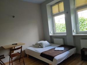Postel nebo postele na pokoji v ubytování 999 Aparthostel