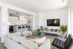 a living room with a couch and a table at Villa Lipa in Jesenice +42 photos