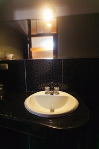 Koupelna v ubytování Hotel Suite Plaza