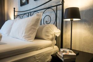 Säng eller sängar i ett rum på Kjølen Hotel Trysil