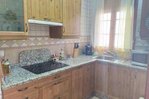 Kuchyň nebo kuchyňský kout v ubytování Vivienda Majaceite