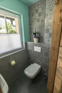 Koupelna v ubytování Ferienhaus Stolz + 10 fotografií