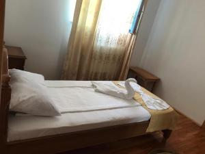 Postel nebo postele na pokoji v ubytování Casa Nursil