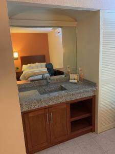 Postel nebo postele na pokoji v ubytování Casagrande Hotel