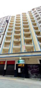 a large apartment building with balconies on top of it at Hotel Plaza Olido in Sao Paulo