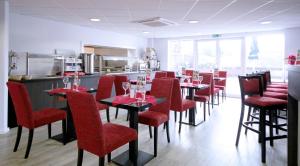 Posezení v ubytování Ramada London Stansted Airport