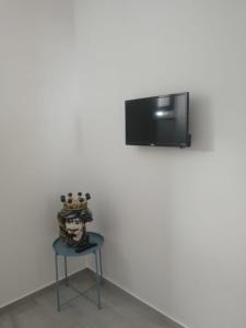 Телевизор и/или развлекательный центр в A casa di Ninuccia