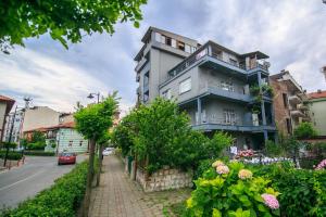 a large building on the side of a street at Amasra Kerem Apart in Amasra