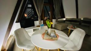 Posezení v ubytování Eco Village Pavlovic