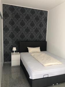 Postel nebo postele na pokoji v ubytování Hotel Restaurant Artemis