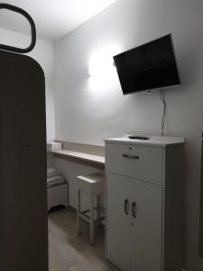 TV a/nebo společenská místnost v ubytování Iris home