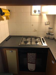 Kuchyňa alebo kuchynka v ubytovaní Bella Vita Apartment + 1 fotografia