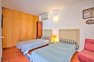 Ένα ή περισσότερα κρεβάτια σε δωμάτιο στο Marina-G +40 φωτογραφίες