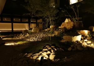 a herd of sheep laying on the ground at night at ORIENTAL HOTEL KYOTO ROKUJO in Kyoto