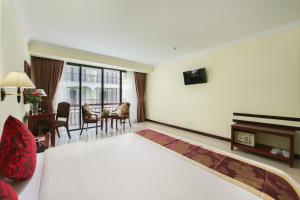 TV a/nebo společenská místnost v ubytování Smiling Hotel