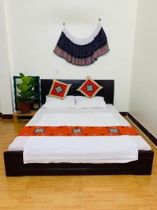 Postel nebo postele na pokoji v ubytování Be's Home & Tours