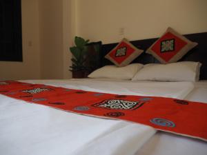 Postel nebo postele na pokoji v ubytování Be's Home & Tours