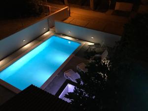 Bazén v ubytovaní Apartmani Sidro alebo v jeho blízkosti
