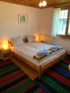 A bed or beds in a room at Borimechkova Kashta