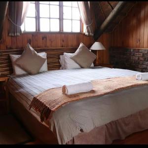 Postel nebo postele na pokoji v ubytování Myoli Beach Lodge + 37 fotografií