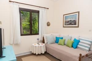 A seating area at ILIOCHARI sea view apartments Oropos - Kalamos