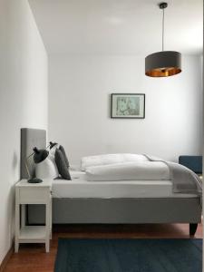 Postel nebo postele na pokoji v ubytování Hotel Lindenufer + 37 fotografií