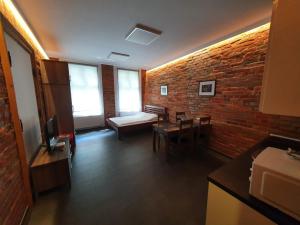 Posteľ alebo postele v izbe v ubytovaní Apartamenty Młyńska 4