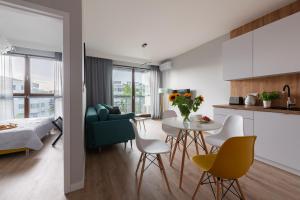 Kuchyňa alebo kuchynka v ubytovaní MODUO Serviced Apartments