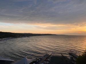 a view of a body of water at sunset at Erzurumlu Hotel in Kilyos