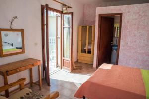 Postel nebo postele na pokoji v ubytování Madalenas B&B