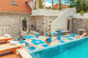 Bazén v ubytování Boutique Hotel Capitano nebo v jeho okolí