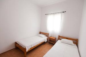 Postel nebo postele na pokoji v ubytování Madalenas B&B