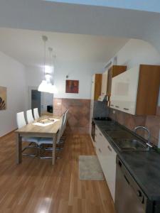 A kitchen or kitchenette at Apartments Medea