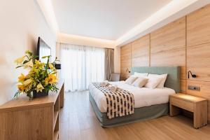 Postel nebo postele na pokoji v ubytování Acandia Hotel