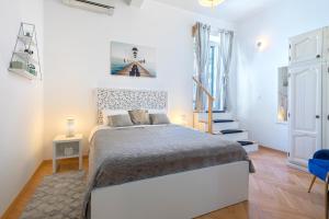 Posteľ alebo postele v izbe v ubytovaní Apartments Caleta