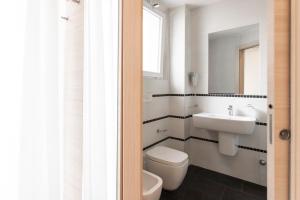 Koupelna v ubytování Hotel Primiana