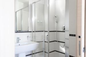 Koupelna v ubytování Hotel Primiana