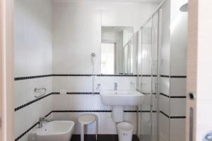 Koupelna v ubytování Hotel Primiana
