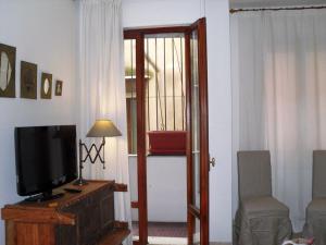A television and/or entertainment centre at Cà Dolce