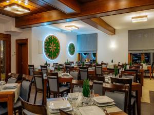 Reštaurácia alebo iné gastronomické zariadenie v ubytovaní Kasprowy