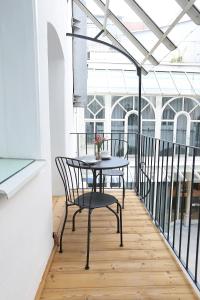 Balkon lub taras w obiekcie Stylische Cityapartments Benedikt