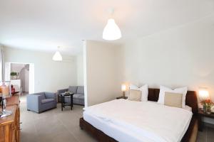 Łóżko lub łóżka w pokoju w obiekcie Stylische Cityapartments Benedikt