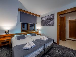 Posteľ alebo postele v izbe v ubytovaní Kasprowy