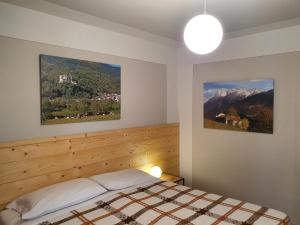 Ένα ή περισσότερα κρεβάτια σε δωμάτιο στο B&B Il Pettirosso