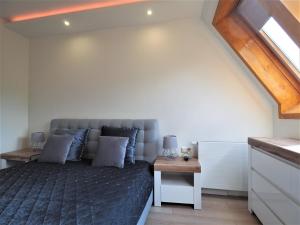 Posteľ alebo postele v izbe v ubytovaní VIP Apartamenty Centrum Przy Równi