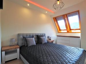 Posteľ alebo postele v izbe v ubytovaní VIP Apartamenty Centrum Przy Równi